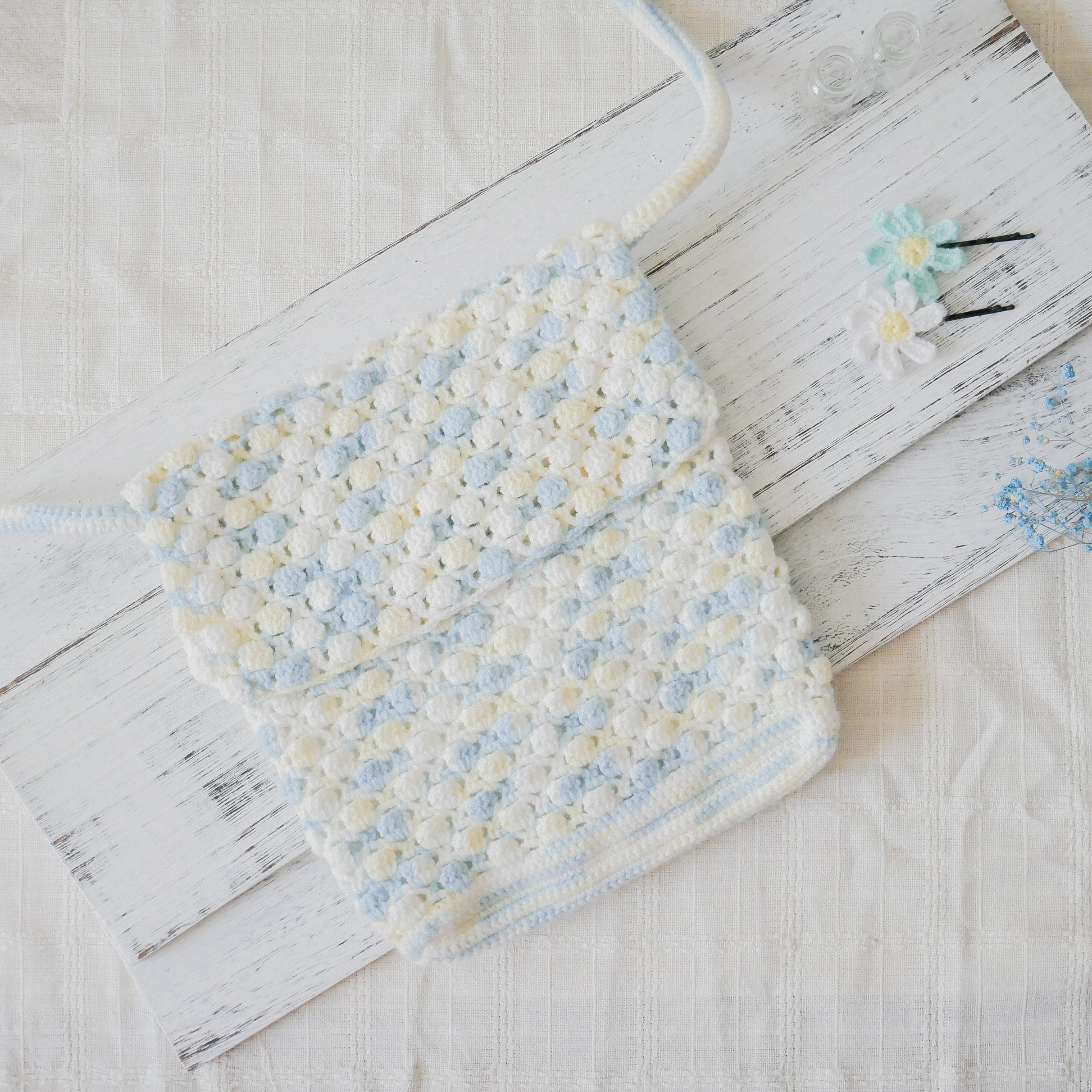 Azora Pom Pom Sling Bag