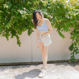 Azora Pom Pom Sling Bag