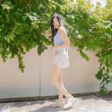 Azora Pom Pom Sling Bag
