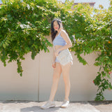 Azora Pom Pom Sling Bag