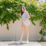 Azora Pom Pom Sling Bag