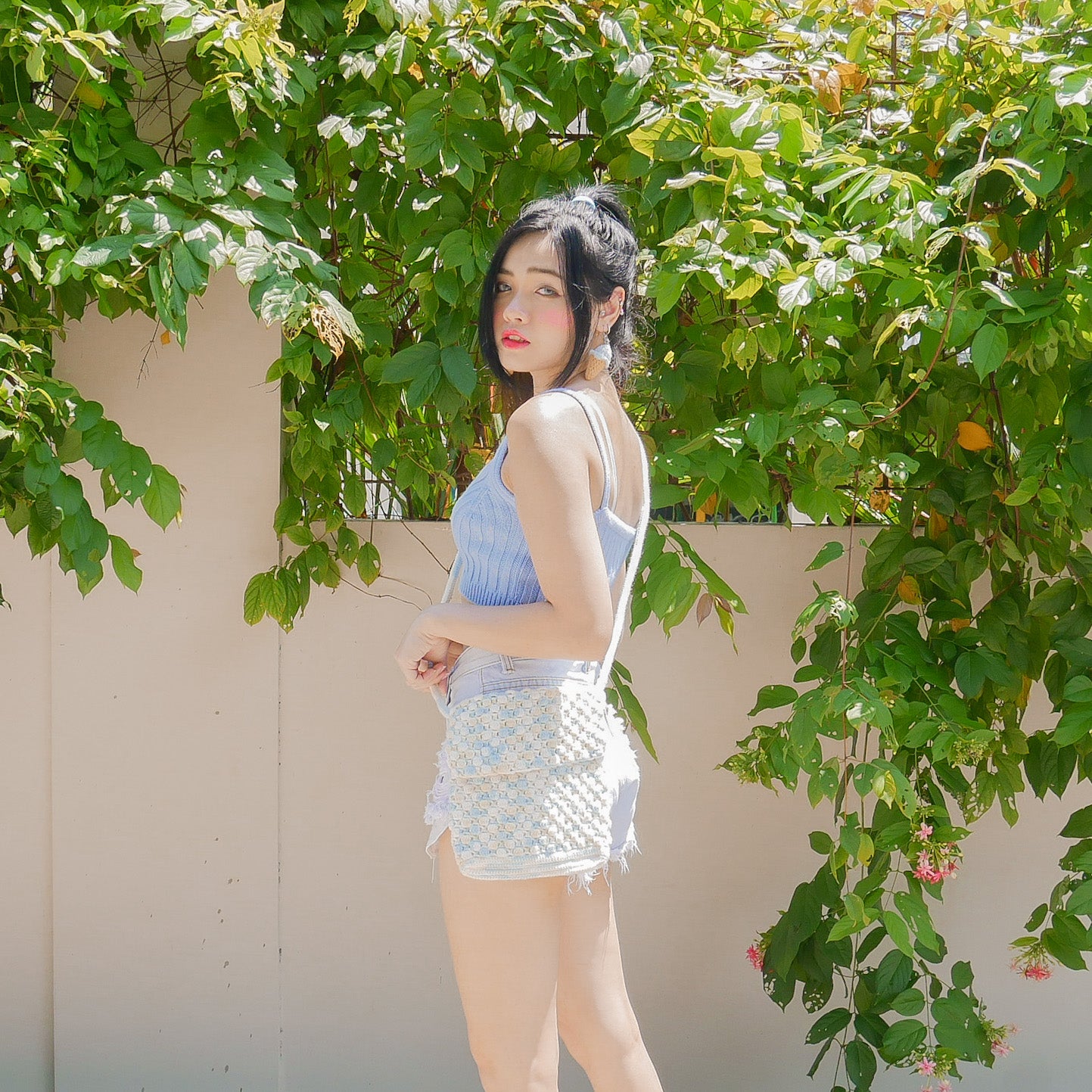 Azora Pom Pom Sling Bag