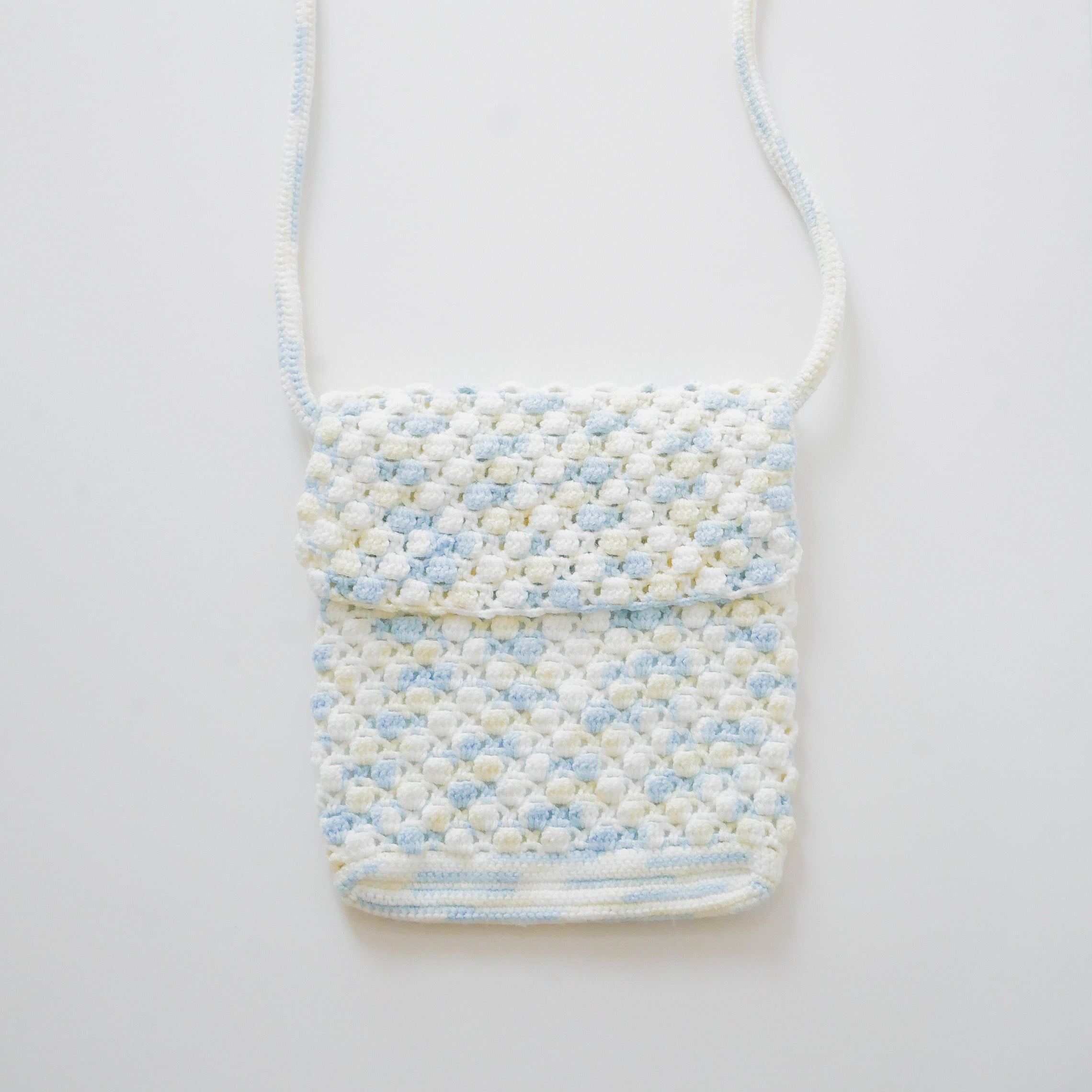 Azora Pom Pom Sling Bag