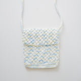 Azora Pom Pom Sling Bag
