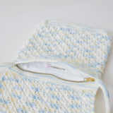 Azora Pom Pom Sling Bag