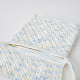 Azora Pom Pom Sling Bag