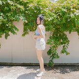 Azora Pom Pom Sling Bag